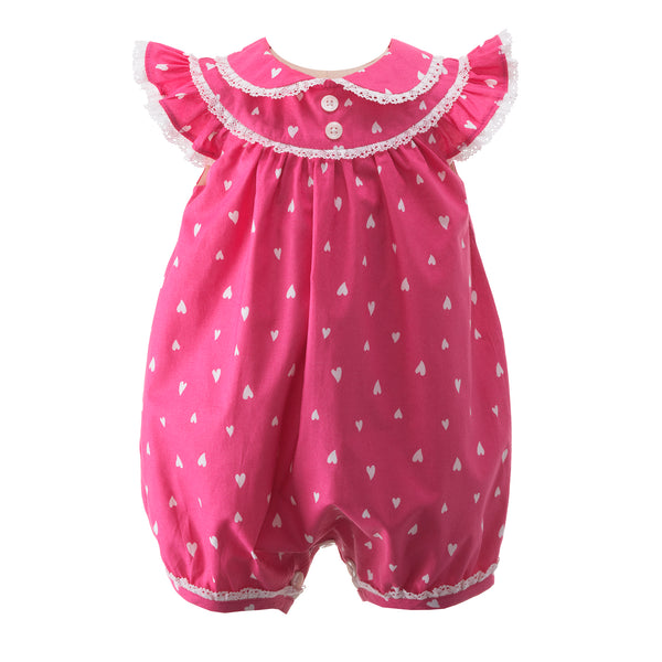 Hot pink babysuit with ivory heart print, trimmed with ivory lace around on peter pan collar and neckline.