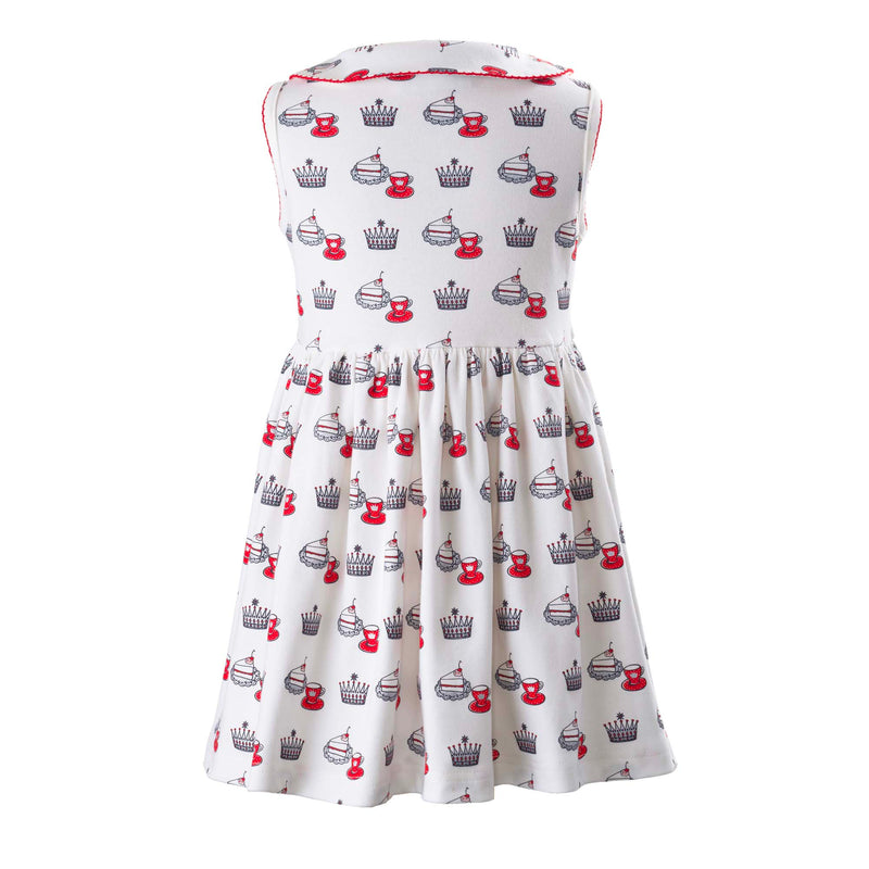 Girls ivory jersey dress with royal team party themed print, peter pan collar and half button placket.