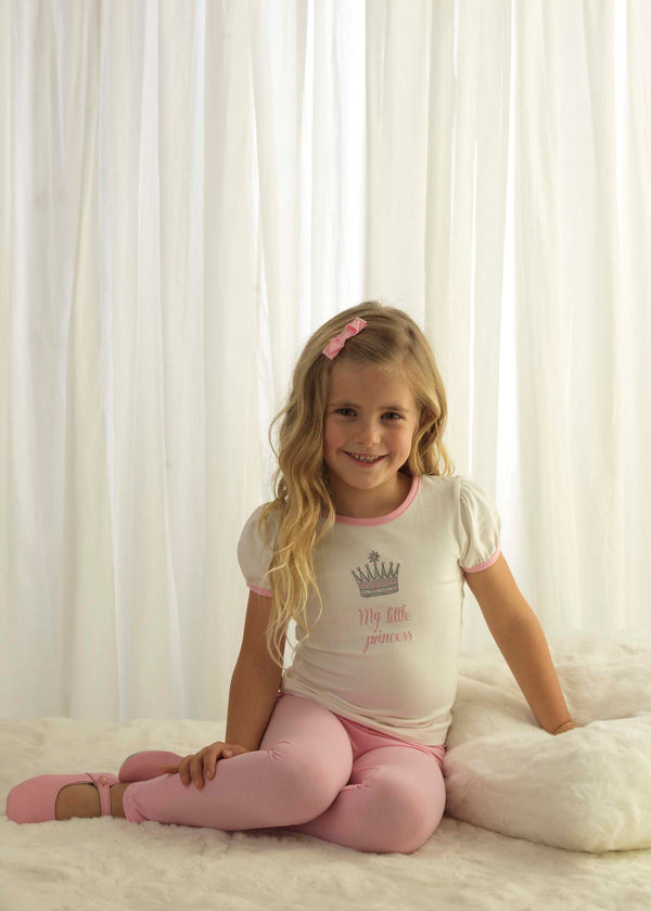 Girl wearing My little princess jersey set styled with matching pink slippers and hairbow.