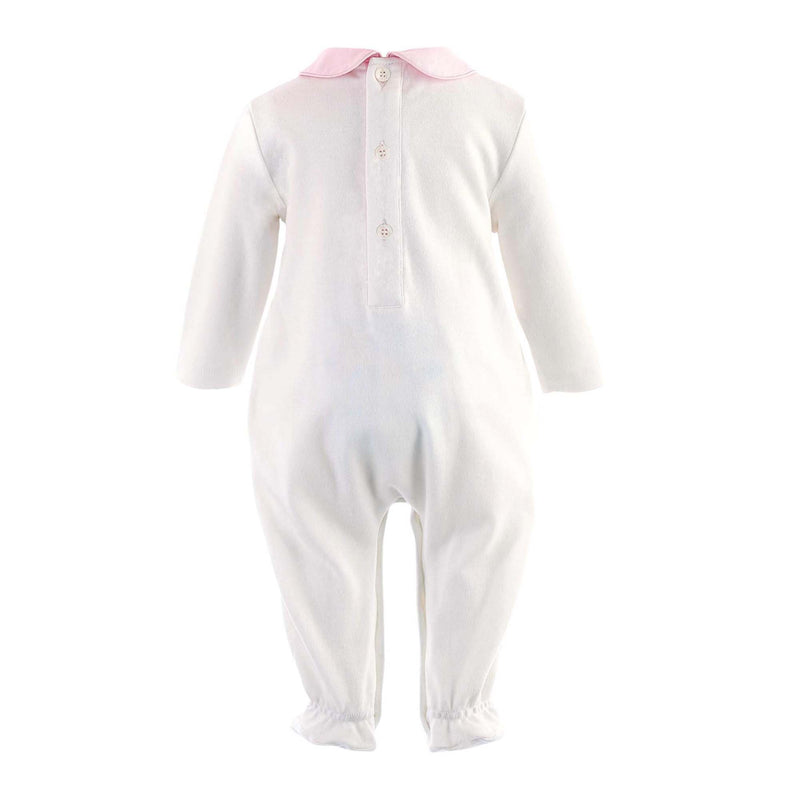 Soft ivory babygro with pink smocked design at the chest and pink peter pan collar