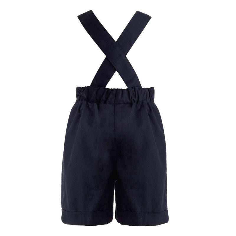 Baby boy navy tailored dungarees with sailboat smocked design on the front panel and turn ups.