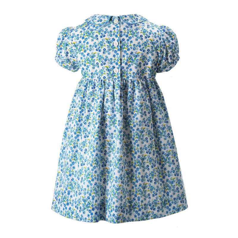 Girls blue floral dress with hand-smocked bodice, peter pan collar and gathered skirt.