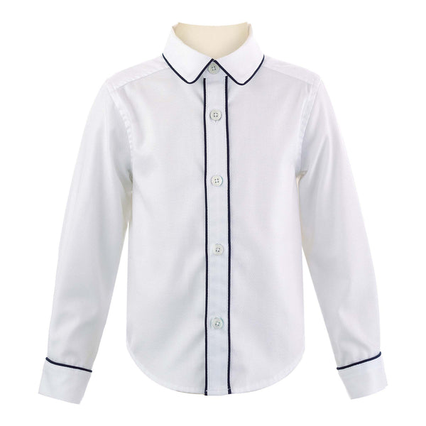 Boys white pique shirt, trimmed with navy pipping at collar edge, cufs and button placket.