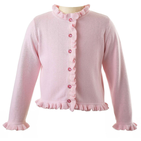 Girls pink cotton cardigan trimmed with frills at front, neck and sleeves and jewel buttons.