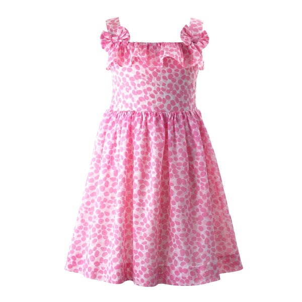 Girls sundress with pink pebble print on ivory background, frills on chest and 3D bows.