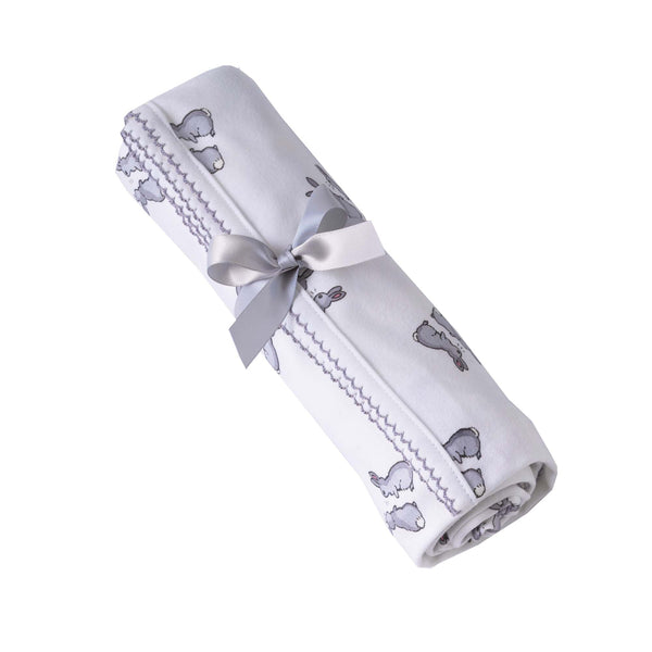 Soft cotton interlock blanket with grey bunnies print on white base, with grey picot trim.