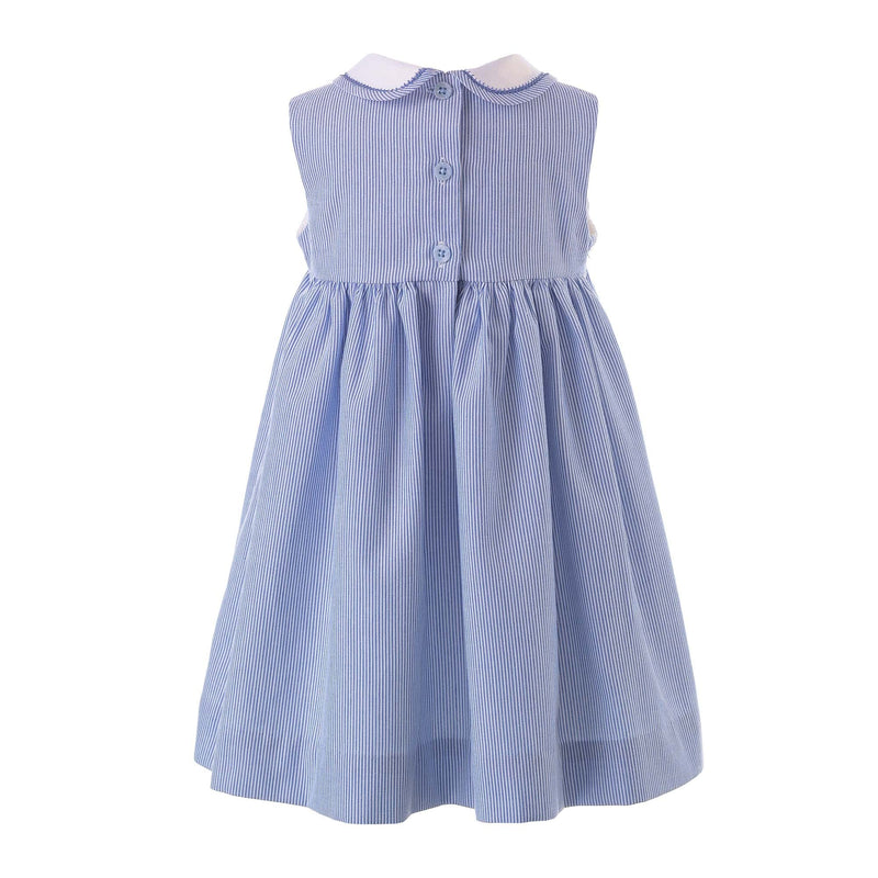 Babies sleeveless blue and ivory stripe dress, with smocked sailboat design and peter pan collar.