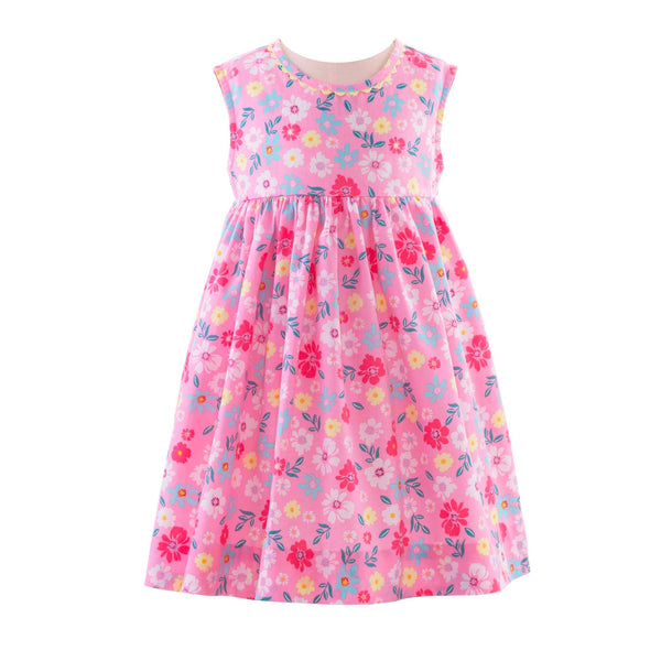 Babies cotton sleeveless dress in floral design on pink background and gathered skirt