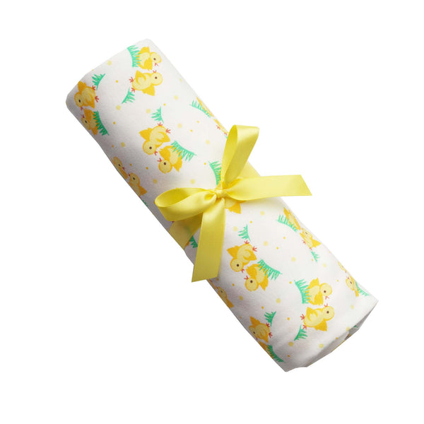 Soft cotton interlock blanket with yellow chicks print on white base, with yellow picot trim.