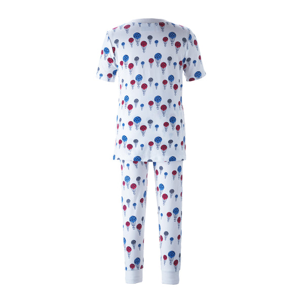 Boys white jersey pyjamas with blue and red hot air balloon print.