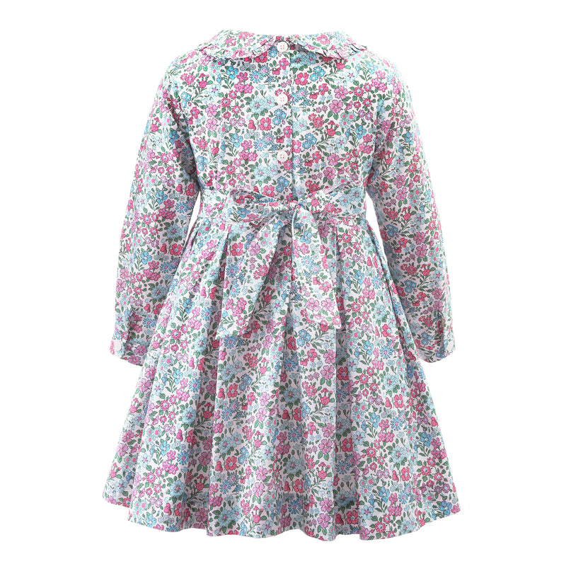 Girls pink and blue floral pleated dress, long sleeves, peter pan collar and sash tie at the back.