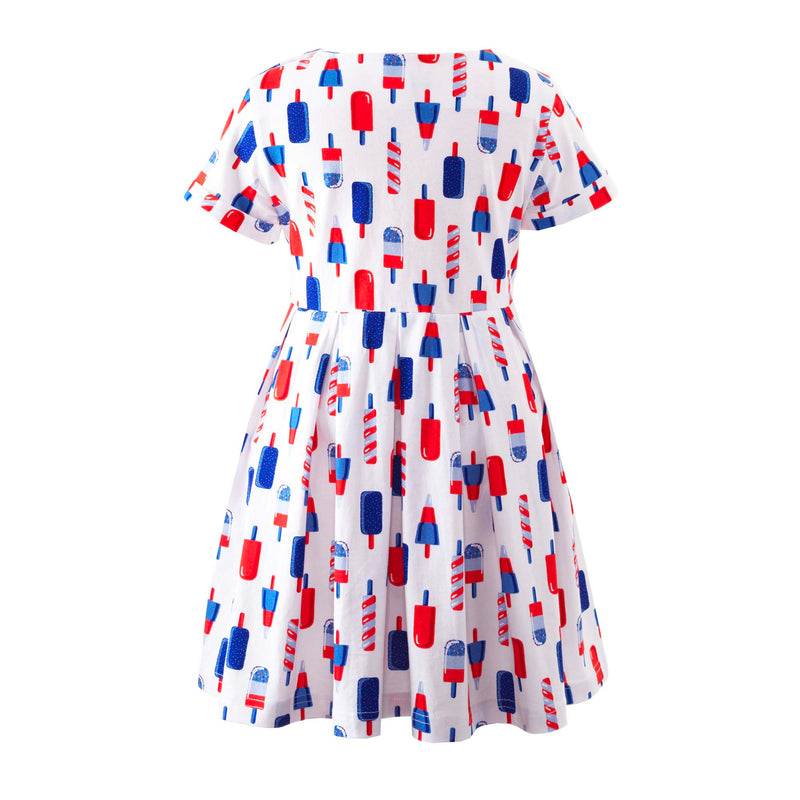 Girls ivory jersey dress with blue and red ice lolly print, pleated skirt and turn-up cuffs.