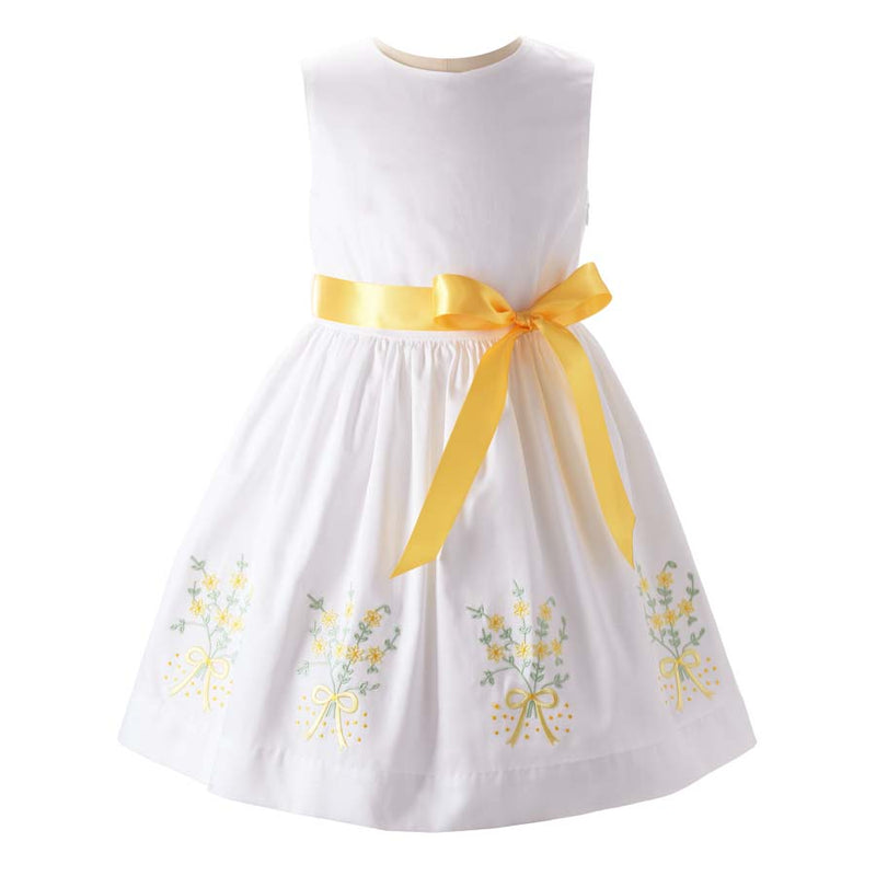 Girls sleeveless ivory dress with yellow and green mimosa embroidery at skirt and ribbon to tie.