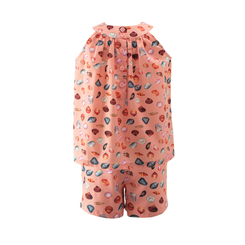 Girls top & shorts set featuring a vibrant sandy beach print on coral pink base.