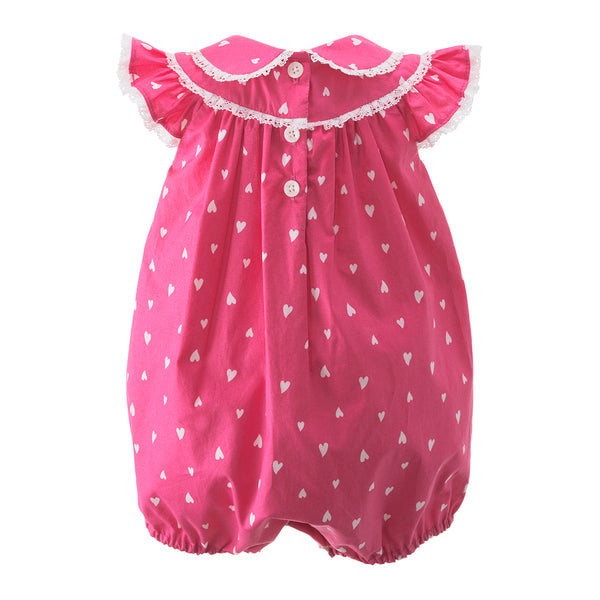 Hot pink babysuit with ivory heart print, trimmed with ivory lace around on peter pan collar and neckline.