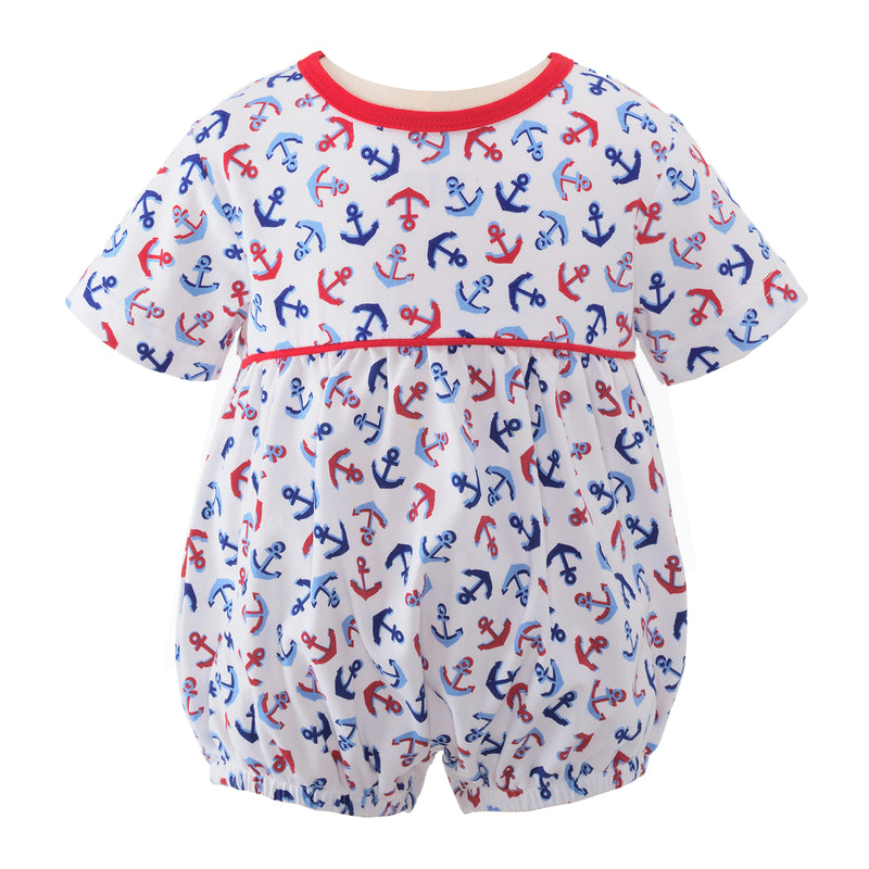 Unisex gathered babysuit with red and blue anchor print and red trimming at the neck and chest.