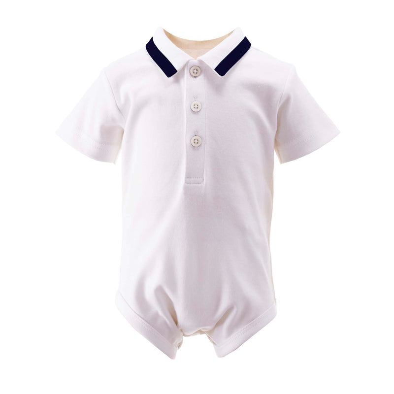 Baby boys white shirt with jersey body, navy ribbon trim on collar and button opening at the front.