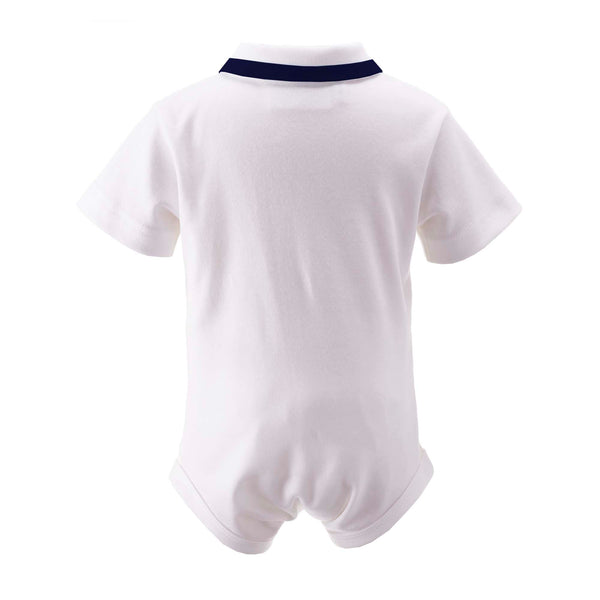 Baby boys white shirt with jersey body, navy ribbon trim on collar and button opening at the front.