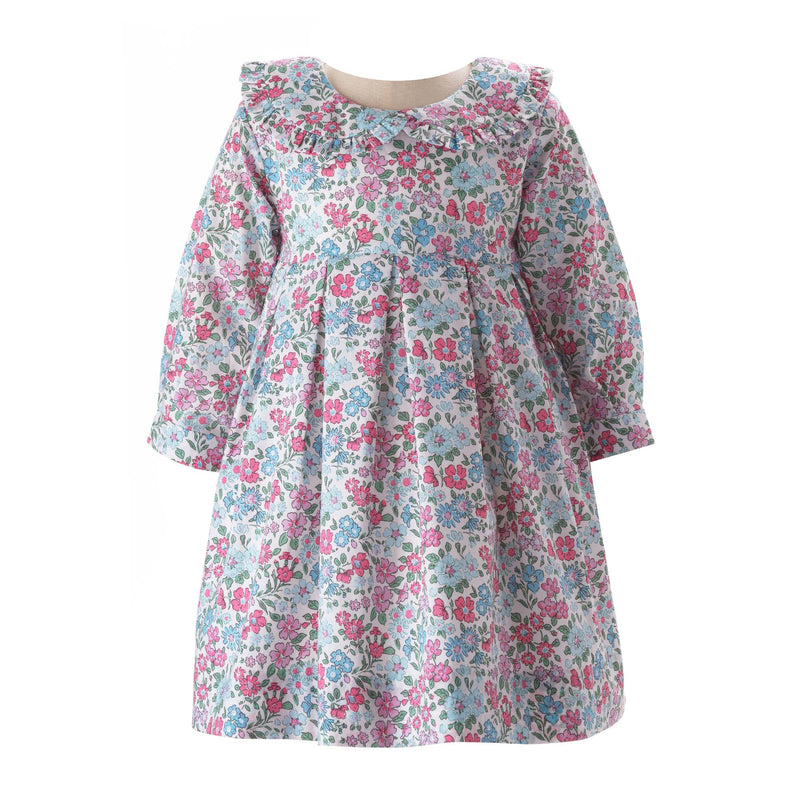 Baby pink and blue floral pleated dress, long sleeves, peter pan collar and sash tie at the back.