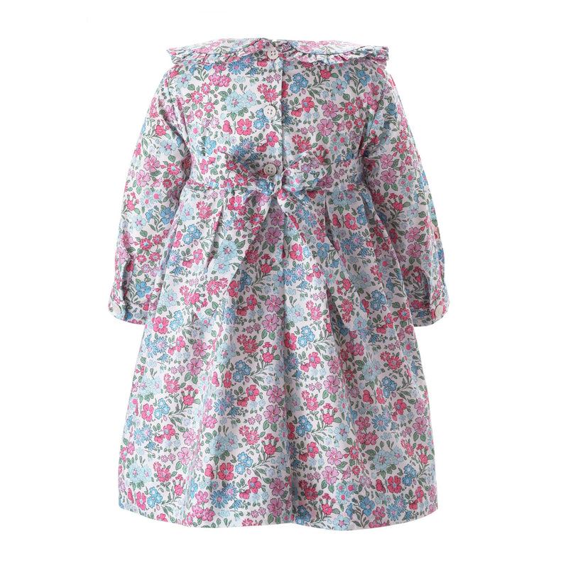 Baby pink and blue floral pleated dress, long sleeves, peter pan collar and sash tie at the back.