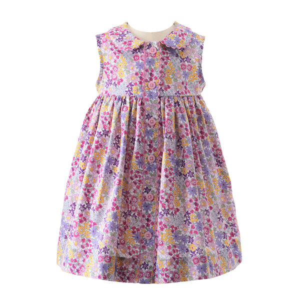 Babies sleeveless button-front dress in summer floral print, ricrac trims and peter pan collar.