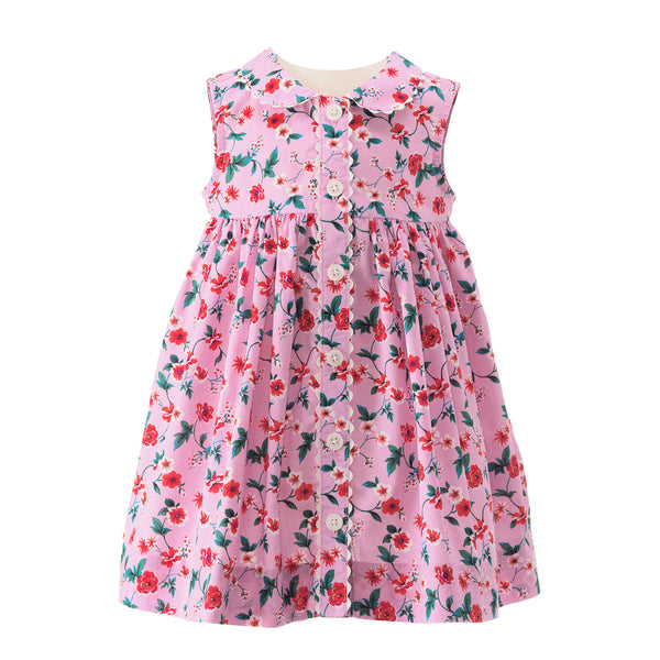 Babies pink sleeveless button-front dress with botanical print and pink ric rac trims and buttons.