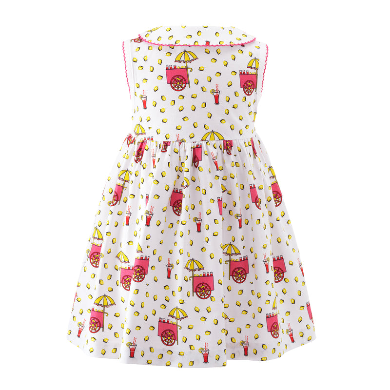 Baby white jersey lemonade stand print dress, half button placket and pink trimmed peter pan collar.