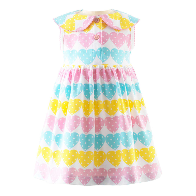 Baby jersey polka dot heart print dress in pastel colours, half button placket and peter pan collar.