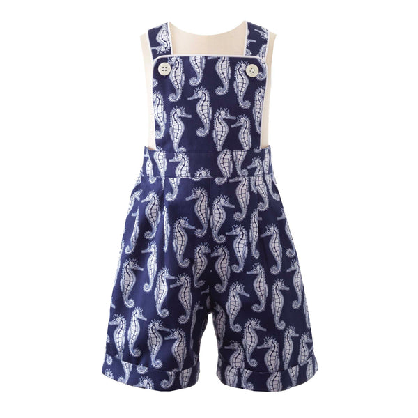 Baby boy navy short dungarees with turn ups and seahorse print, ivory piping and adjustable straps