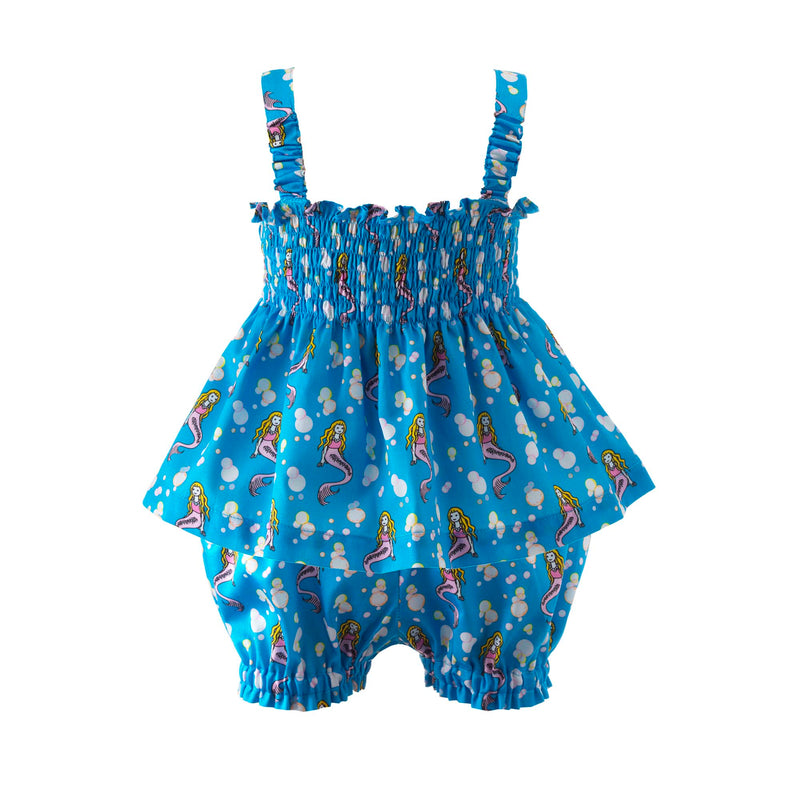 Babies ruched top with bows on straps and matching shorts with mermaid print on blue background.