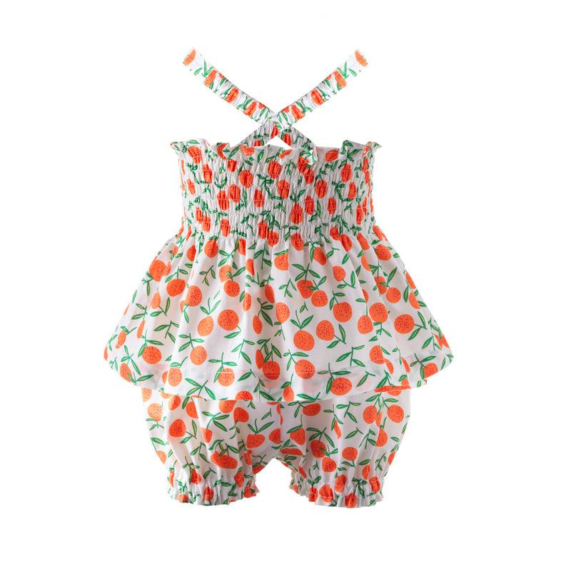 Babies ruched top with bows on straps and matching shorts with tangerine print on ivory background.