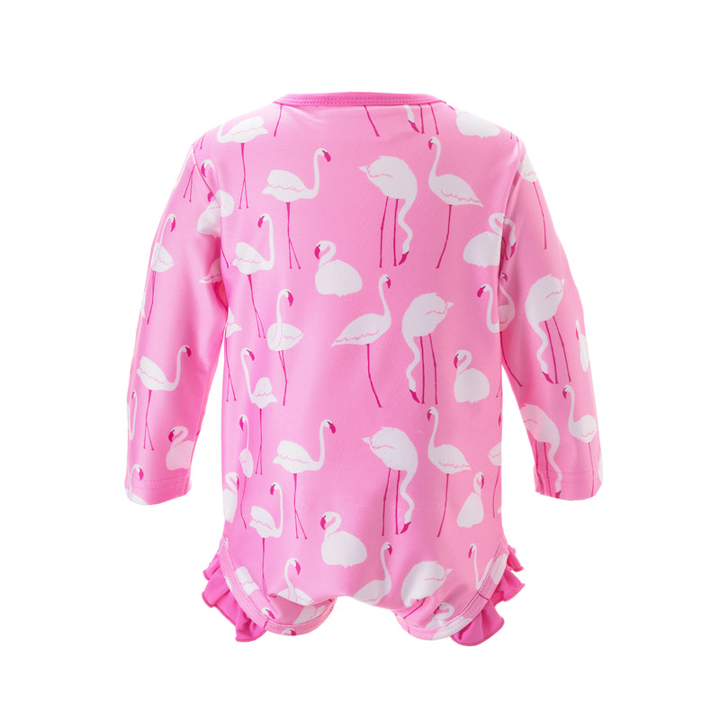 Baby pink one piece rash guard with flamingo print, long sleeves and frill at the leg.