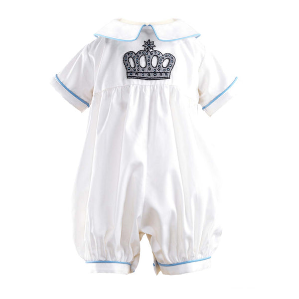 Ivory babysuit with crown embroidered motif on chest and blue piping at collar and cuffs.