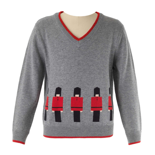 Boys grey sweater with soldier intarsia design, ribbed red v-neck, waistband and cuffs