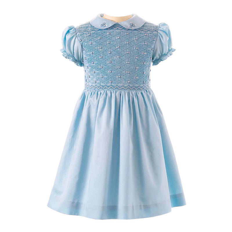 Girls blue dress with smocked bodice, embroidered with roses, peter pan collar and gathered skirt.