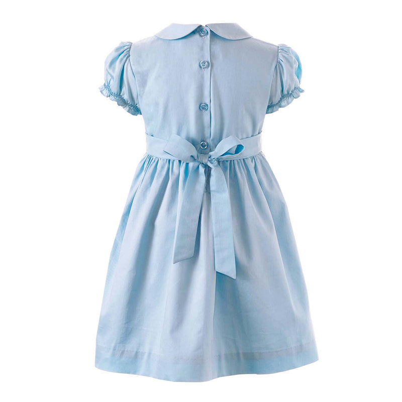 Girls blue dress with smocked bodice, embroidered with roses, peter pan collar and gathered skirt.