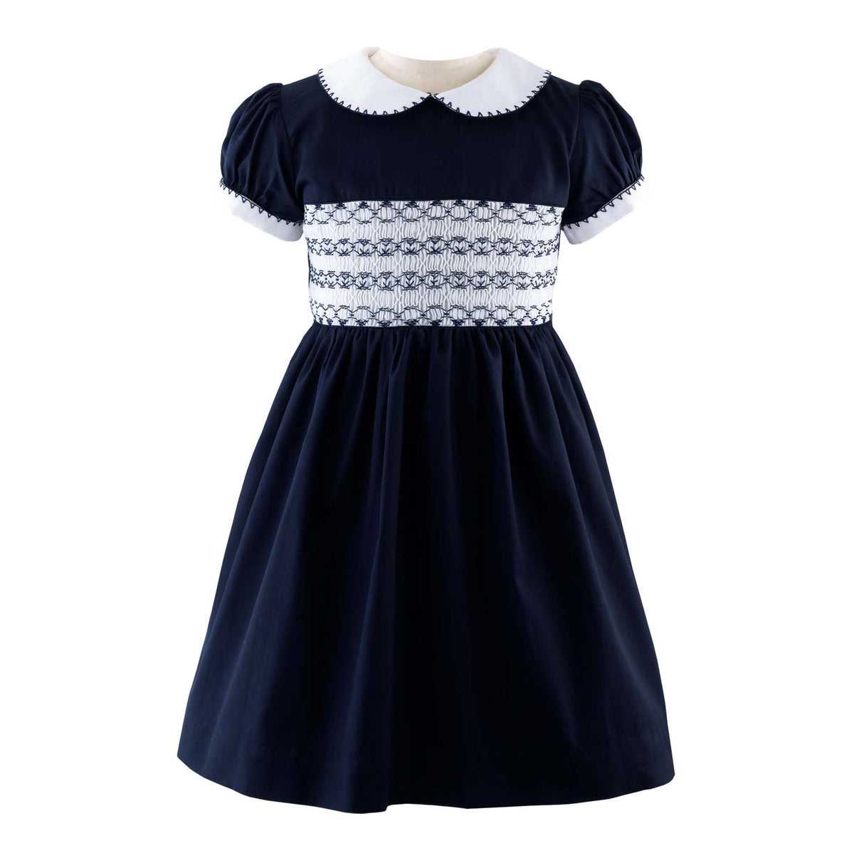 Girls navy smocked dress with ivory peter pan collar and short puff sleeves.