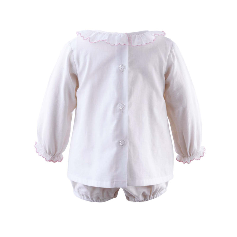 Pink trim frill collar blouse with jersey body underneath and long sleeves.