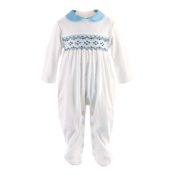 Soft ivory babygro with blue smocked design at the chest and blue peter pan collar