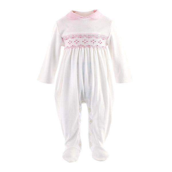 Soft ivory babygro with pink smocked design at the chest and pink peter pan collar