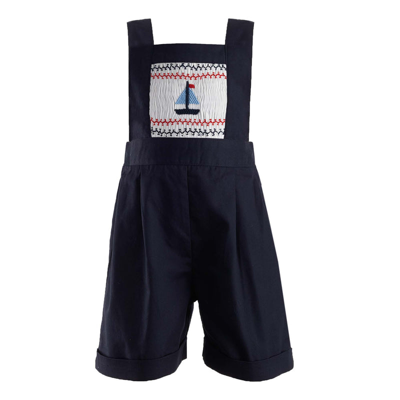 Baby boy navy tailored dungarees with sailboat smocked design on the front panel and turn ups.