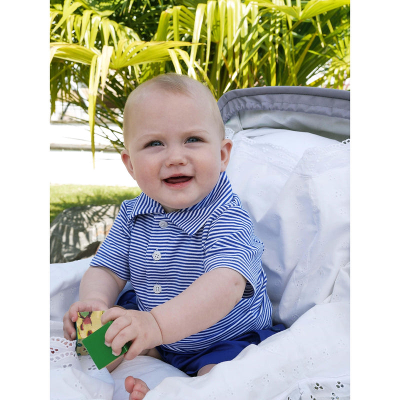 Baby boy wearing blue striped jersey polo shirt and matching blue pocket shorts.